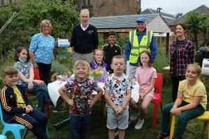 Left to right Robert Dunn, club president; Ricky McKell, Eagles Wings; Frances Parry, Cornerstone; Katrina Saunders, Cairn Fowk; Judy McGreal, Brae Riding; Tina Brown (for Linda Falconer), Dundee Food Bank, and John Irvine, club community service convener